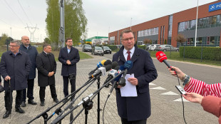 Przemysław Carnek przed Fabryką Broni