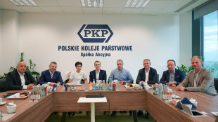 Dominik Hołuj wraz z rodzicami w siedzibie PKP S.A.